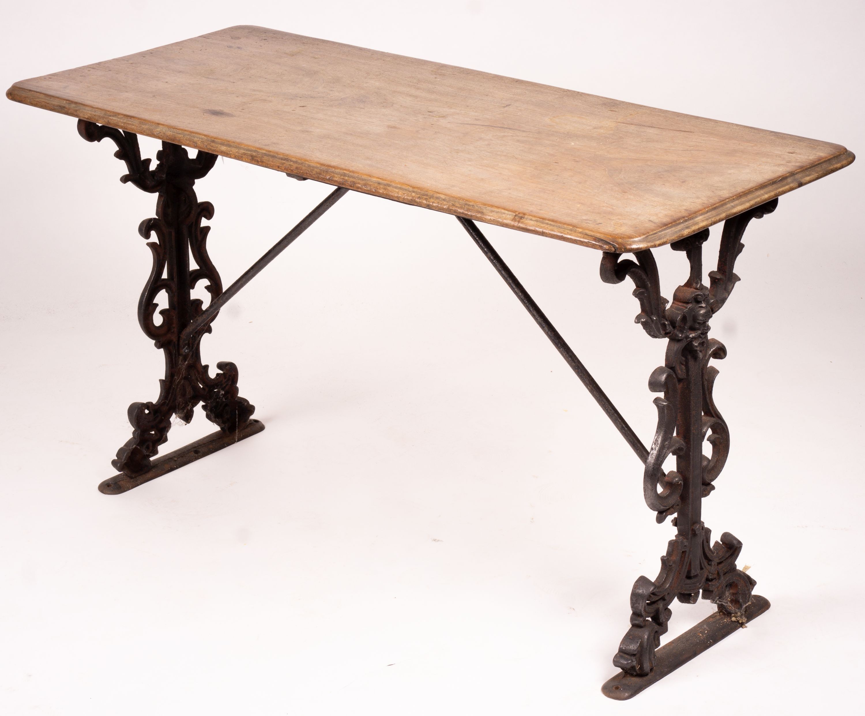 A Victorian style rectangular mahogany and cast iron tavern table, width 120cm, depth 52cm, height 69cm